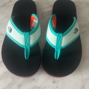 The North Kids Face Aqua and Black Sandals